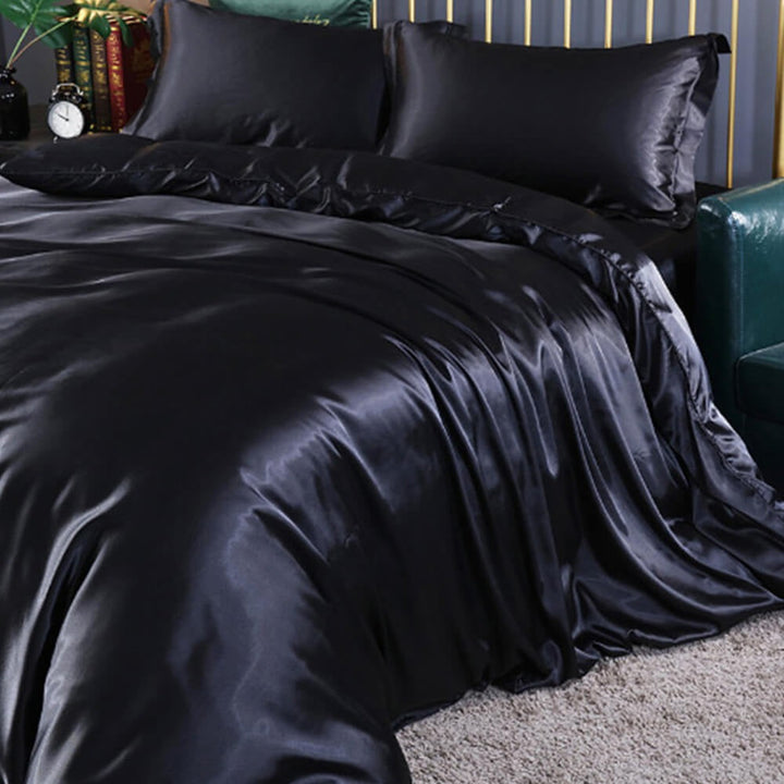 Elegant cooling satin bed sheet set with double-sided design. Quilt cover & pillowcases elevate your bedroom aesthetic.