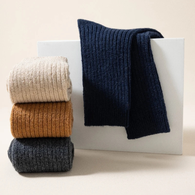 Unisex cozy wool boot socks, offering superior warmth and a soft, comfortable fit.