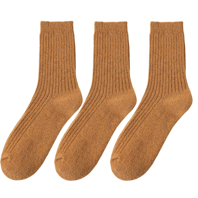 Warm, plush wool socks, perfect for winter, offering comfort and warmth for any wearer.