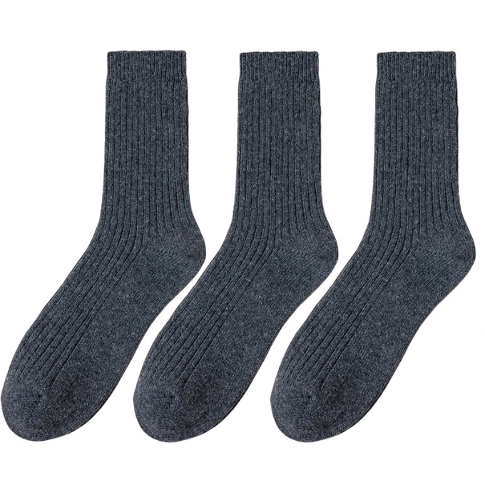 Close-up of the soft inner lining of a knit wool winter sock, showing its cozy feel.