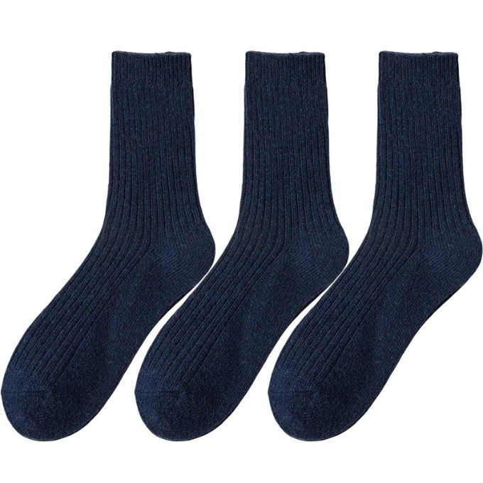 Cozy knit wool socks for outdoor winter activities, offering plush warmth and durability.
