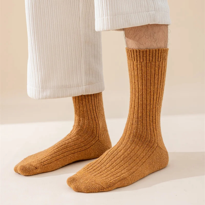 Soft, plush knit wool socks, designed for unisex warmth and a comfortable winter experience.