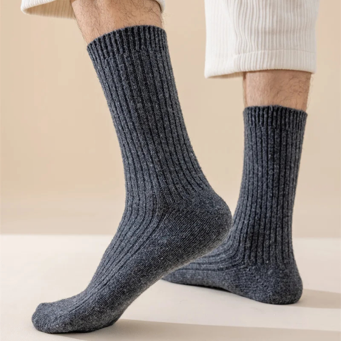 Unisex wool boot socks in a rich color, offering plush warmth for cold winter days.