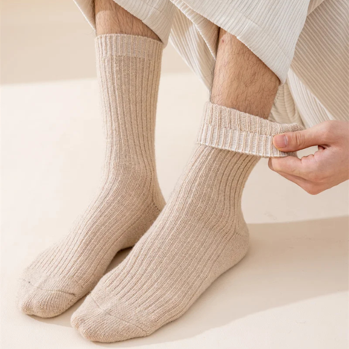 Warm knit wool socks for winter, perfect for staying cozy and comfortable in boots.