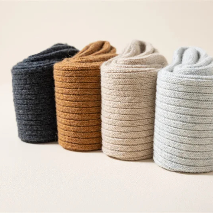 Plush grey wool winter socks, ideal for unisex comfort and exceptional warmth.