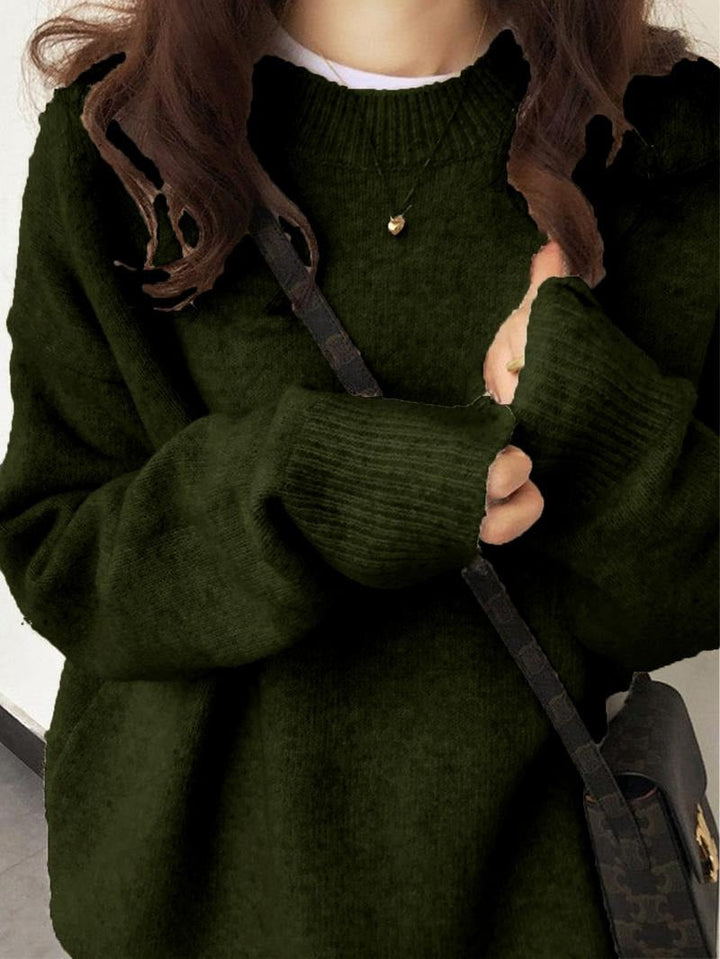 Model wearing a relaxed fit women's brushed knit pullover sweater in a casual winter setting