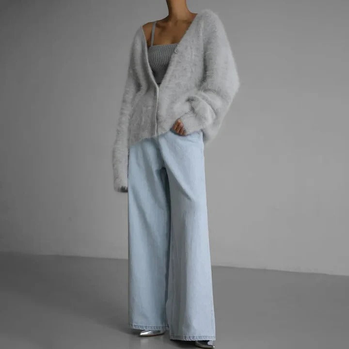 Warm long sleeve women's knitwear sweater with a classic round neck, ideal for winter style.