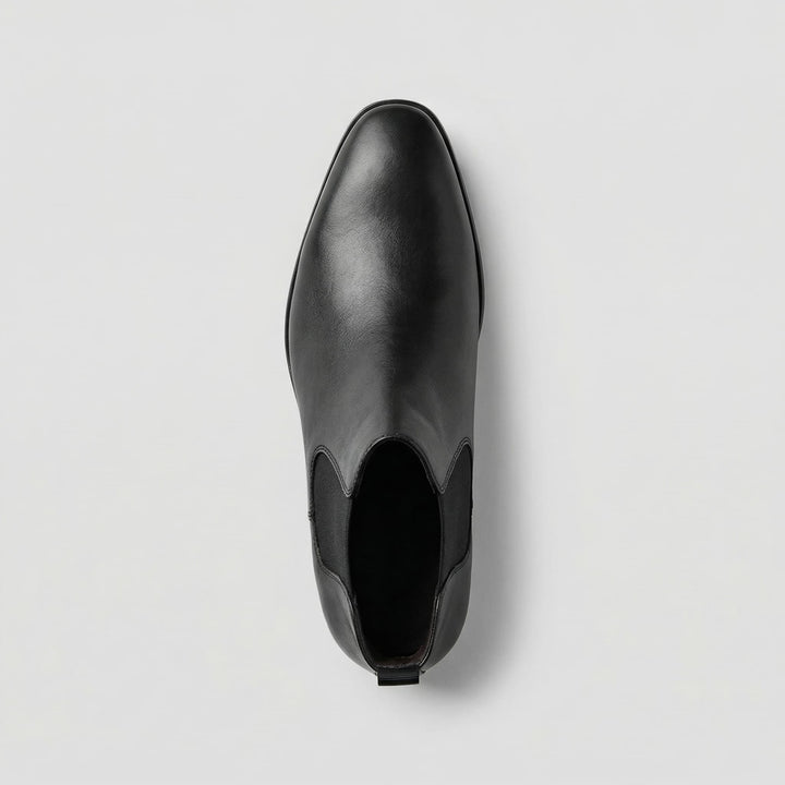 Stylish grey men's Chelsea boots. Versatile slip-on footwear, ideal for everyday comfort and style.