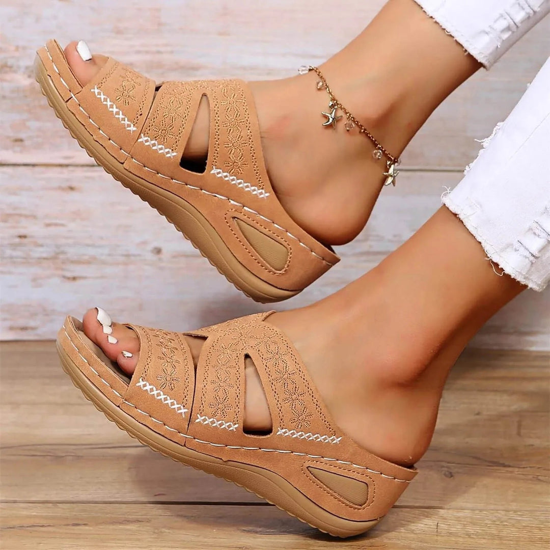 Women's orthopedic cross-strap sandals with adjustable comfort for walking & everyday wear.