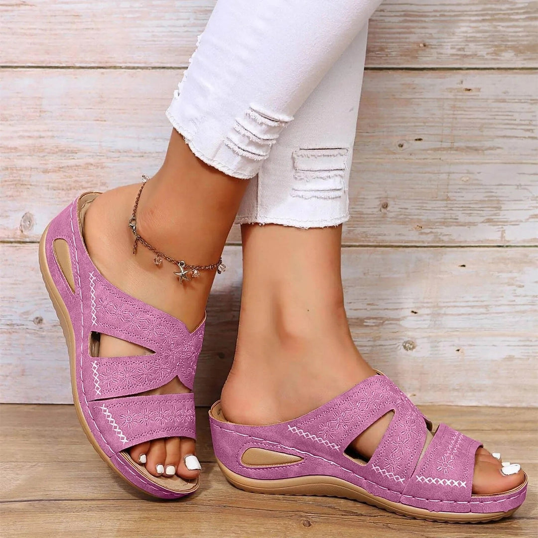 Everyday women's orthopedic comfort sandals with adjustable cross-straps for summer casual wear & foot support.