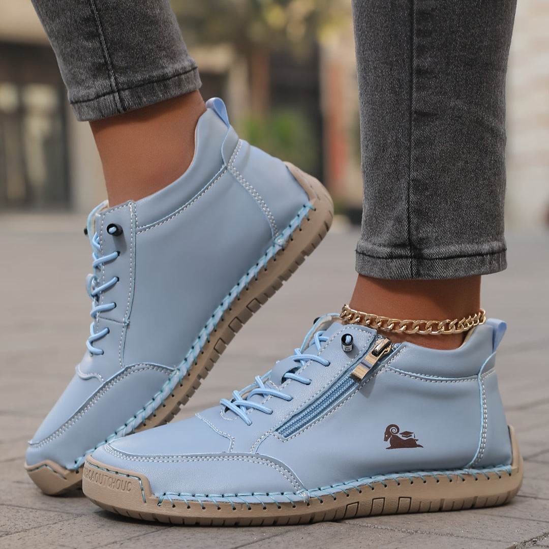 Side profile of Danielle zip-up sneakers in gray, ideal for walking