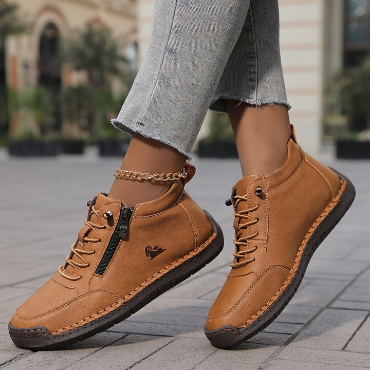 Close-up of zipper on Danielle zip-up sneakers for easy on/off