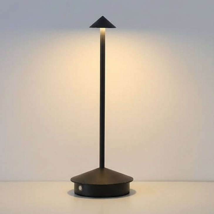 Sleek wireless LED spotlight illuminating a plant in an outdoor garden, dimmable for mood lighting.