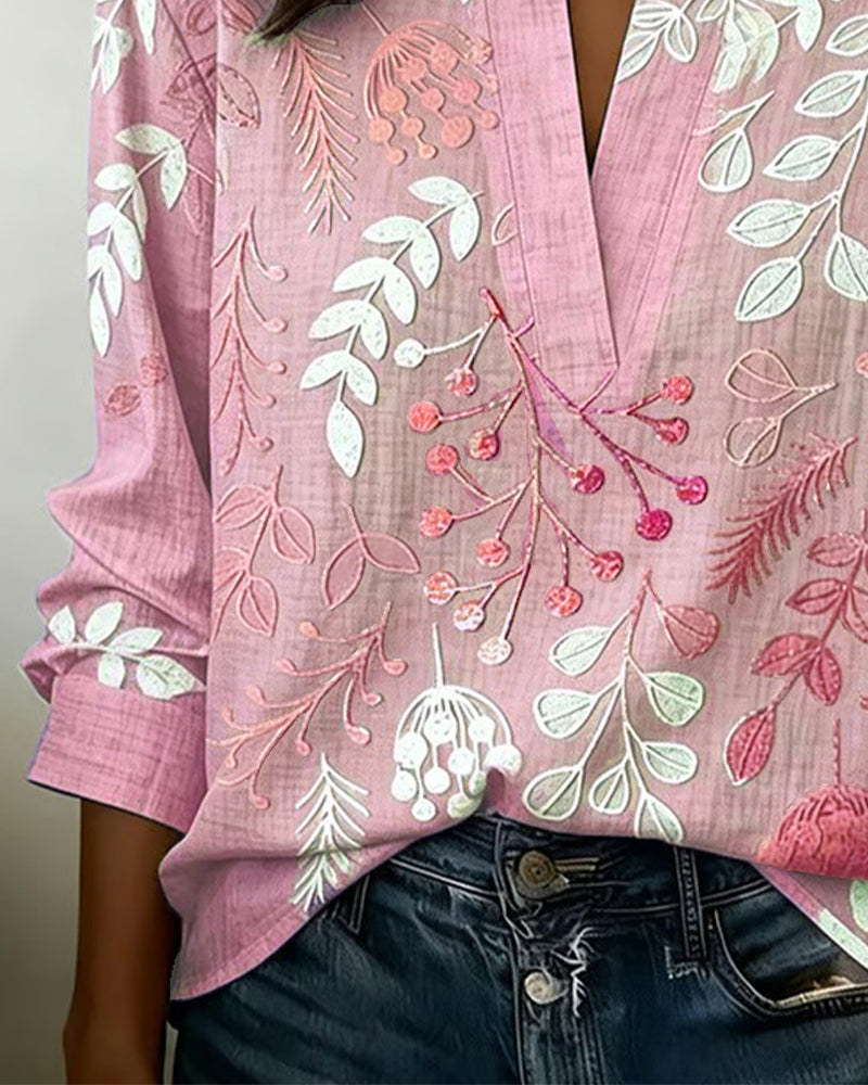 Women's Pastel Floral V-Neck Blouse, an essential for a versatile spring wardrobe.