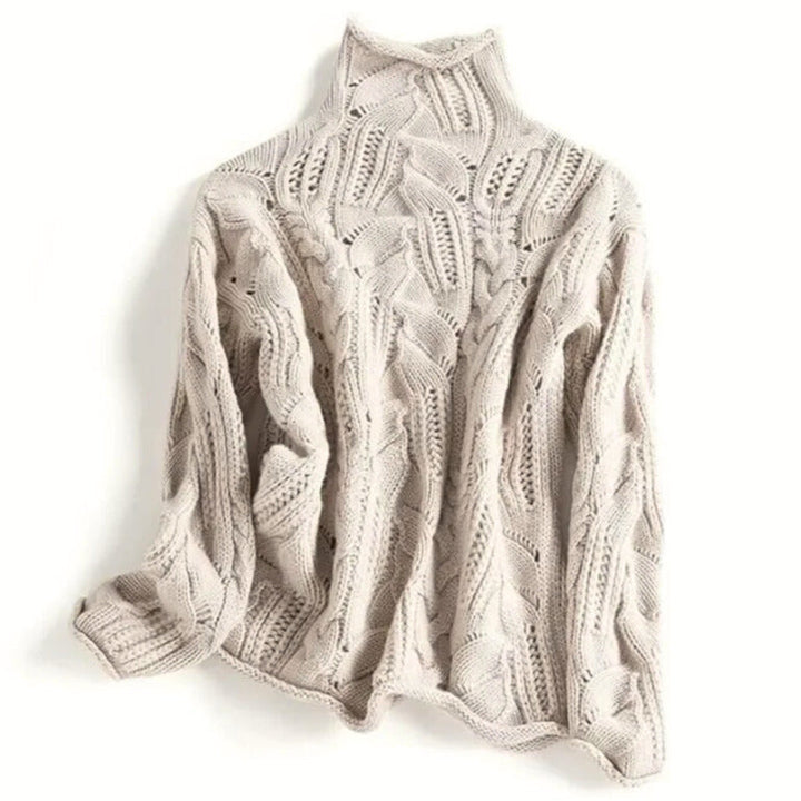 Stylish women's blue wavy cable knit turtleneck sweater. Elegant, casual chic knitwear for winter & fall.