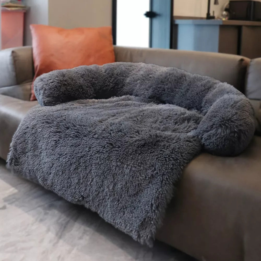 Soft pet sofa dog bed offering ultimate comfort & anxiety relief. Stylish, washable dog accessory for home decor.