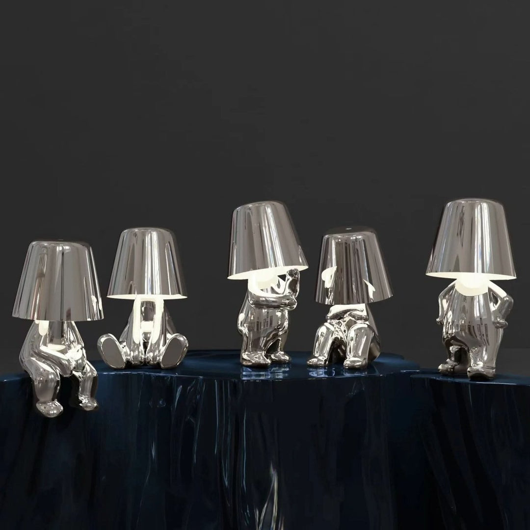 Elegant gold LED table lamp, offering dimmable warm light for any modern interior design.