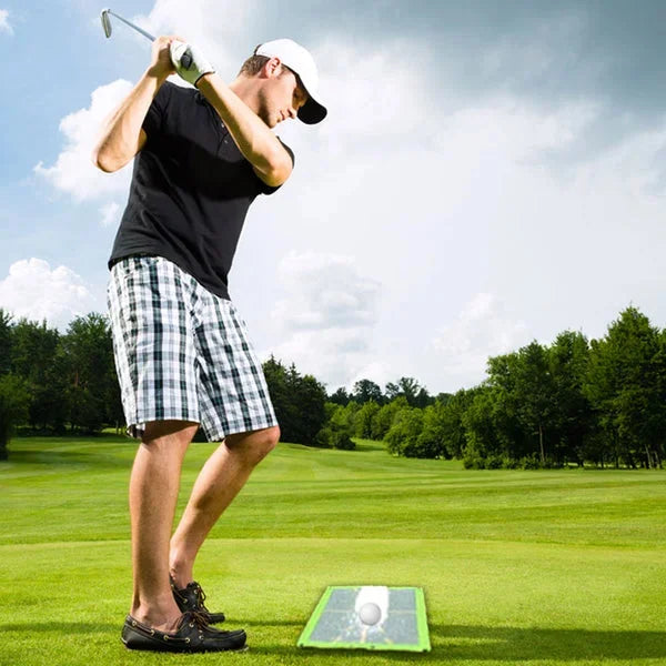 "Durable golf training mat showing swing path divots, ideal for indoor/outdoor use with robust tear-resistant material."