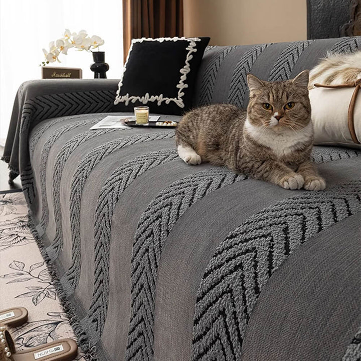 Durable herringbone chenille sofa cover. Protects furniture, adds cozy living room decor.