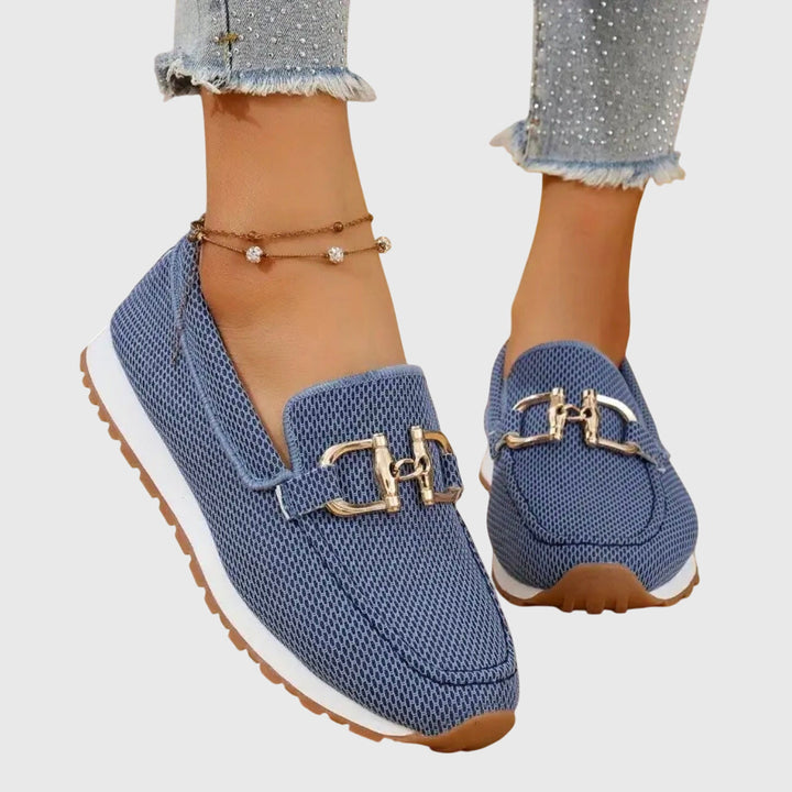 Dusty blue women's loafers with a classic horsebit detail. Comfortable slip-on style for everyday wear.