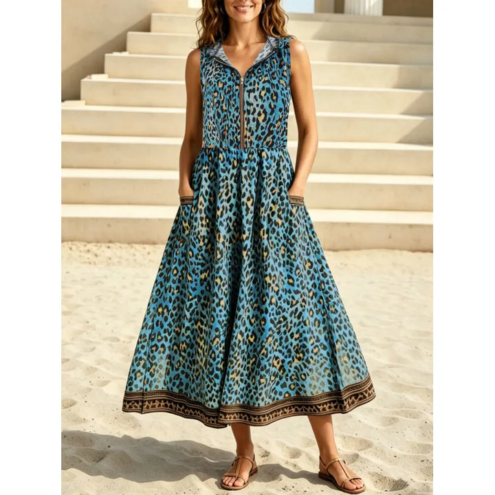 Comfortable women's flowy leopard print maxi dress with a hood & pockets, ideal for versatile summer fashion.
