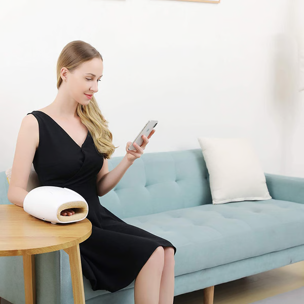 Electric hand massager with ergonomic design, advanced air compression, and heat therapy for relaxation and pain relief.