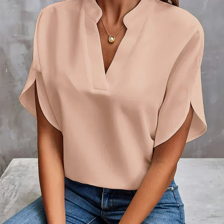 Versatile women's elegant blouse, lightweight long sleeve design. Stylish top suitable for office & casual wear.