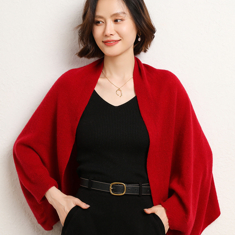 Soft and warm beige knit shawl wrap, a versatile addition to any woman's collection.