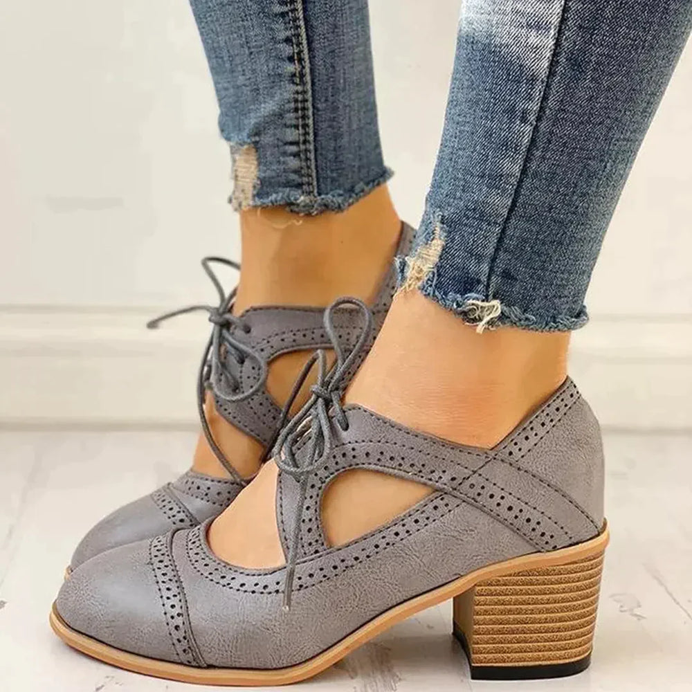 Elegant black heeled lace-up T-strap dress shoes for women, perfect for formal events, vintage style