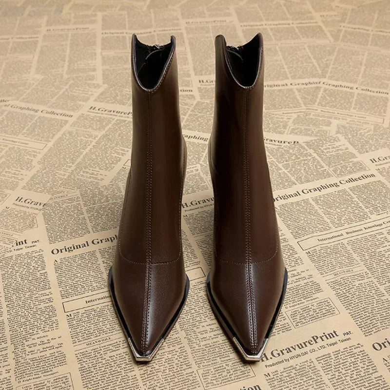 Front view of women's pointed-toe heel ankle boots, highlighting the elegant silhouette for spring.