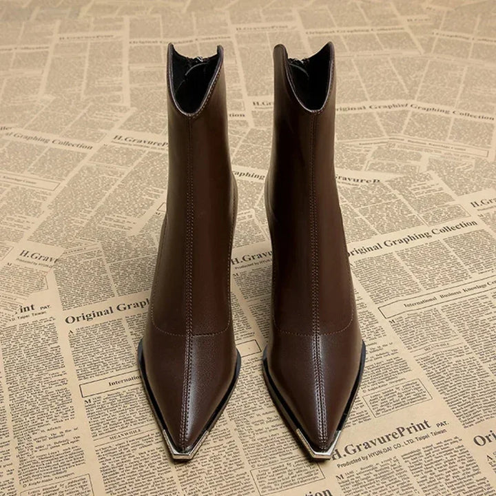 Front view of women's pointed-toe heel ankle boots, highlighting the elegant silhouette for spring.