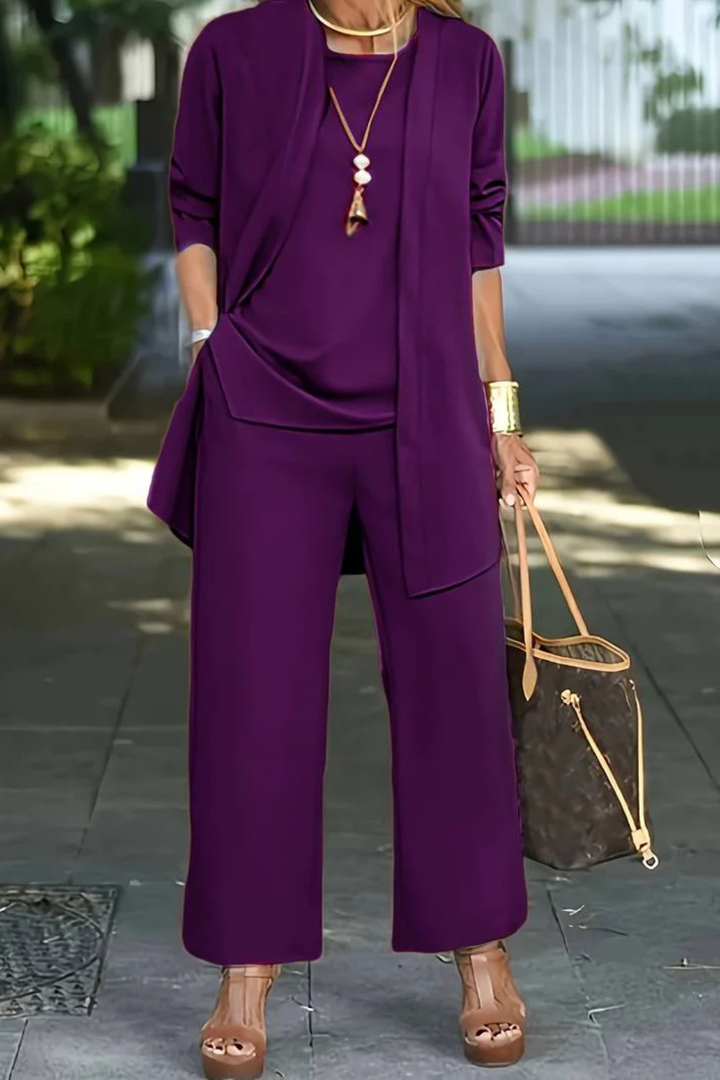 Elegant women's 3-piece suit, designed for comfort and sophisticated style at formal events.