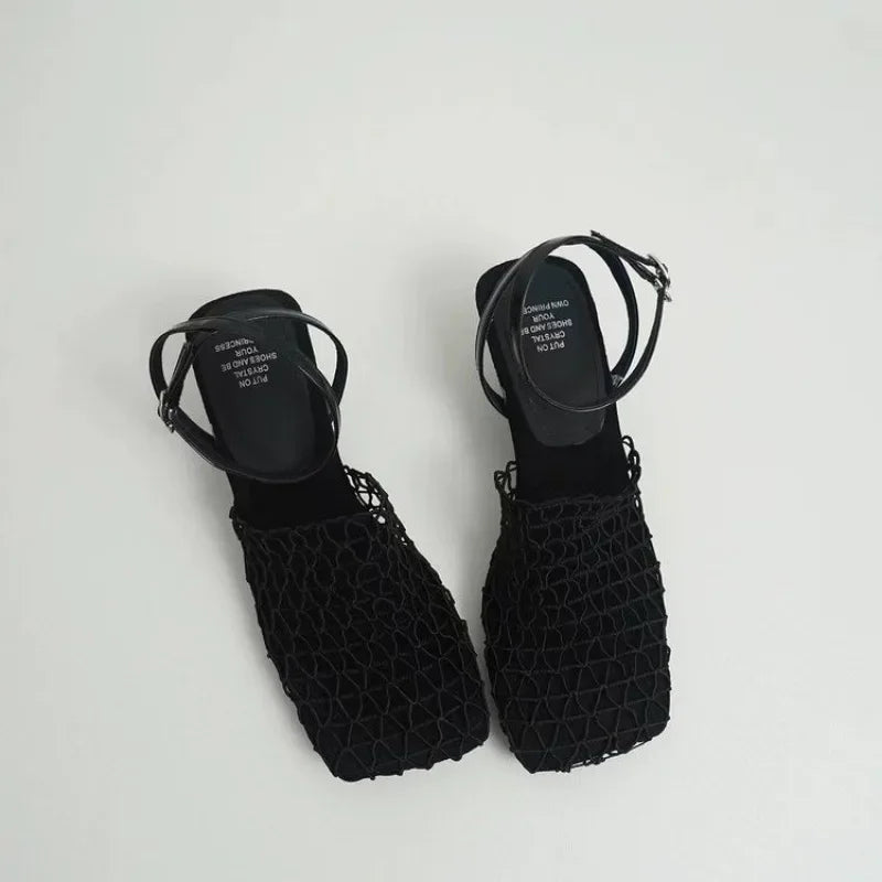 Stylish black sculpted square-toe mesh heels for women with ankle strap, front view