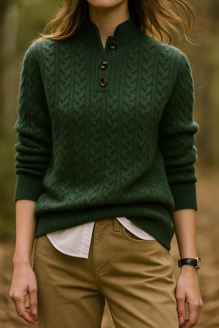 Close-up of the intricate cable knit pattern on a luxurious cashmere blend women's sweater