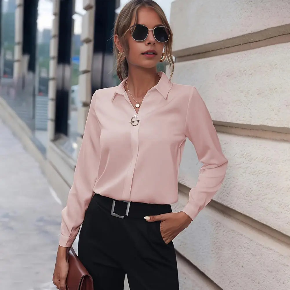 Stylish women's long sleeve chiffon blouse with flowy design. Versatile elegant top for spring outfits.