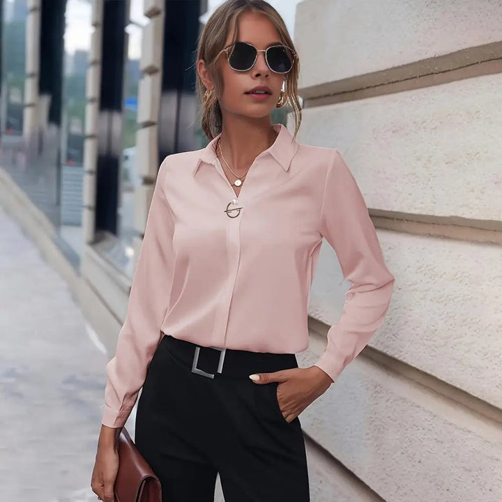 Stylish women's long sleeve chiffon blouse with flowy design. Versatile elegant top for spring outfits.