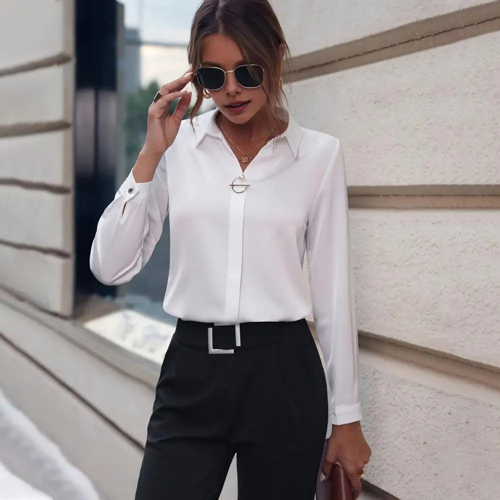 Elegant women's flowy long sleeve chiffon blouse. Perfect for office or casual chic styling.