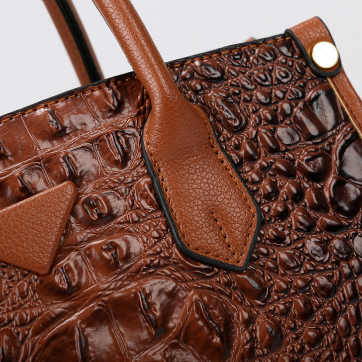 Fashionable women's handbag in croc-embossed faux leather, a timeless and elegant choice