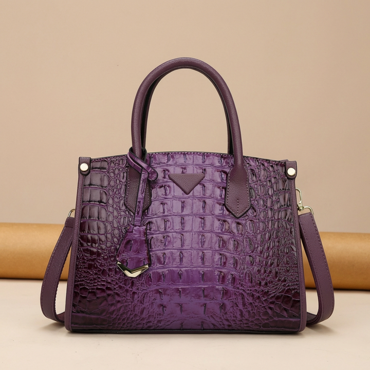 Women's elegant croc-embossed shoulder bag, showcasing its sophisticated design and texture
