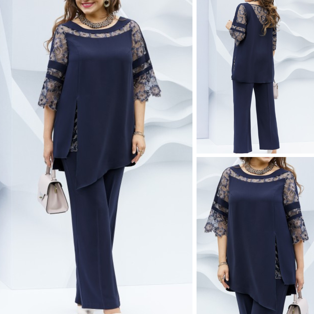 Elegant dark blue two-piece set for women, featuring a sophisticated blouse and tailored trousers. Perfect for stylish occasions.
