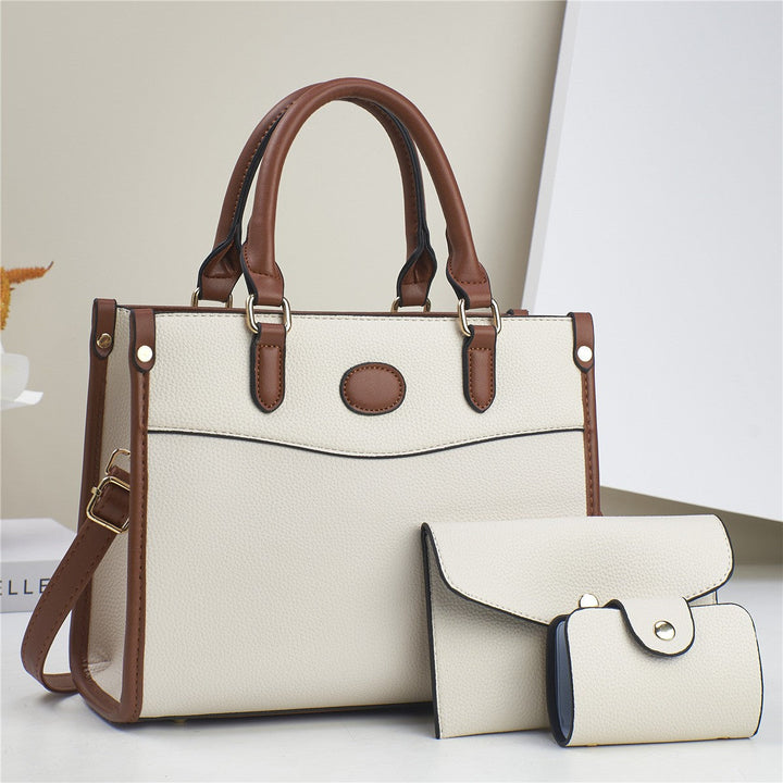 Stylish faux leather shoulder bag, part of a 3-piece set for women, a chic fashion accessory.