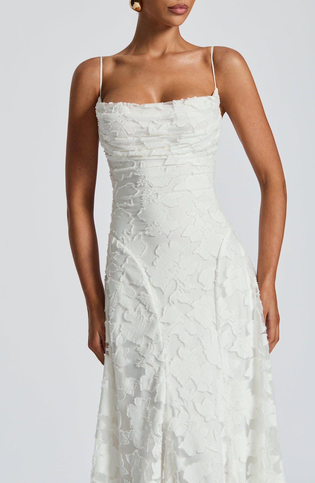 Chic women's floral A-line maxi party dress, an elegant long gown with spaghetti straps for special nights.
