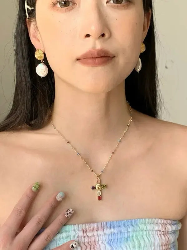 Gold plated cross necklace, a beautiful and dainty piece of cubic zirconia gemstone jewelry for women