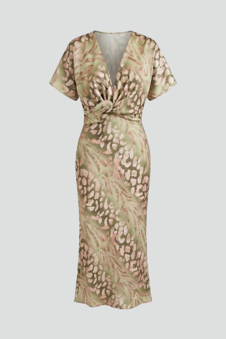 Elegant green floral pleated midi dress for women with V-neck and short sleeves, perfect for spring/summer events.