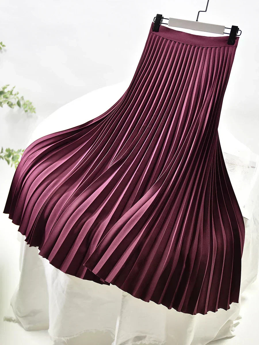 Stylish fall fashion women's elegant pleated midi skirt. High-waist, perfect for office, party or casual chic.