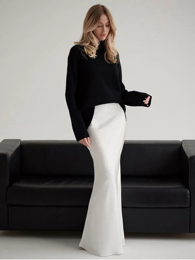 Fashionable high-waisted fishtail long skirt, elegant women's wear for galas.