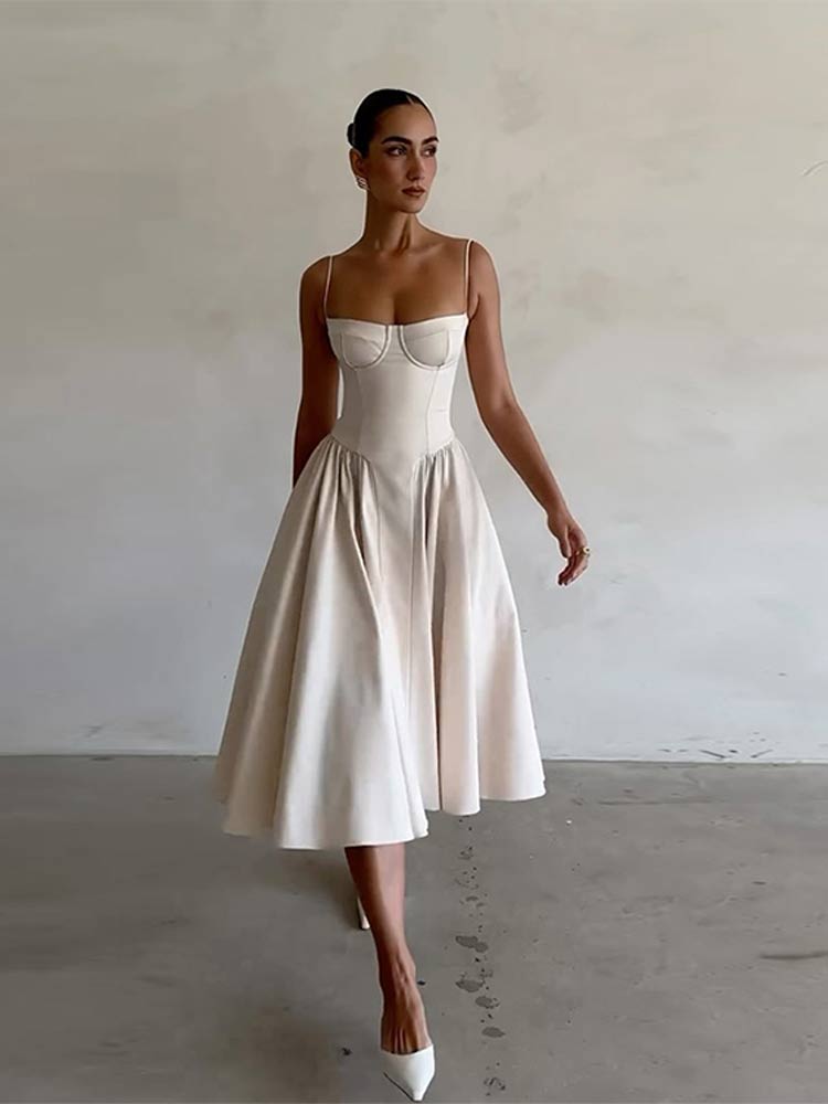 Amara elegant pleated midi dress. Versatile formal wear, perfect as a party outfit or special occasion dress.