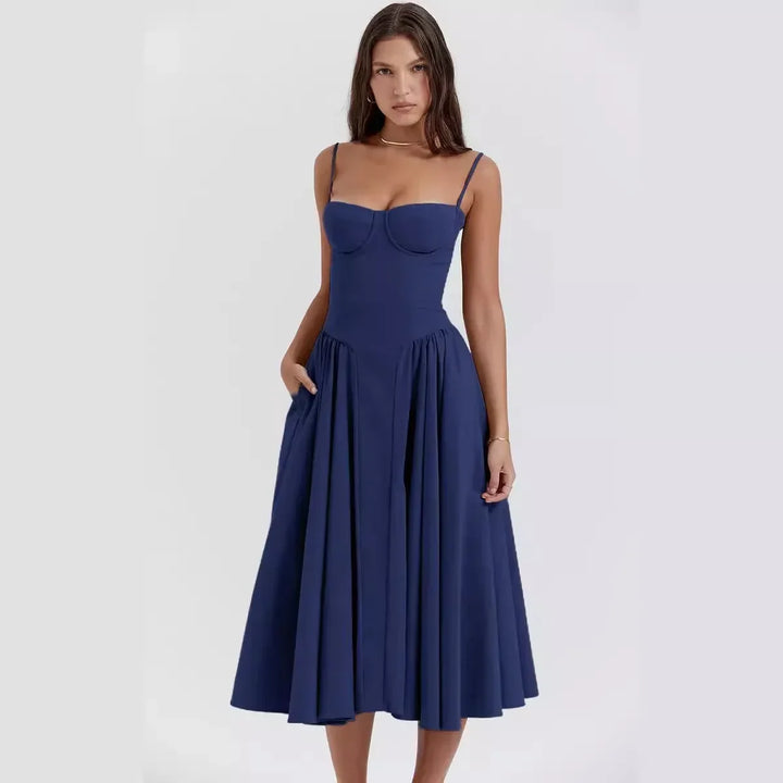 Women's elegant pleated midi dress with a stylish backless design for evening events and formal wear.