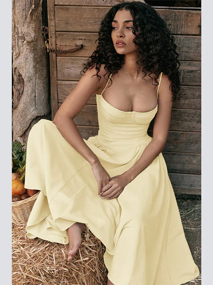Chic backless pleated midi dress for women. An elegant evening gown, perfect for special occasion formal events.