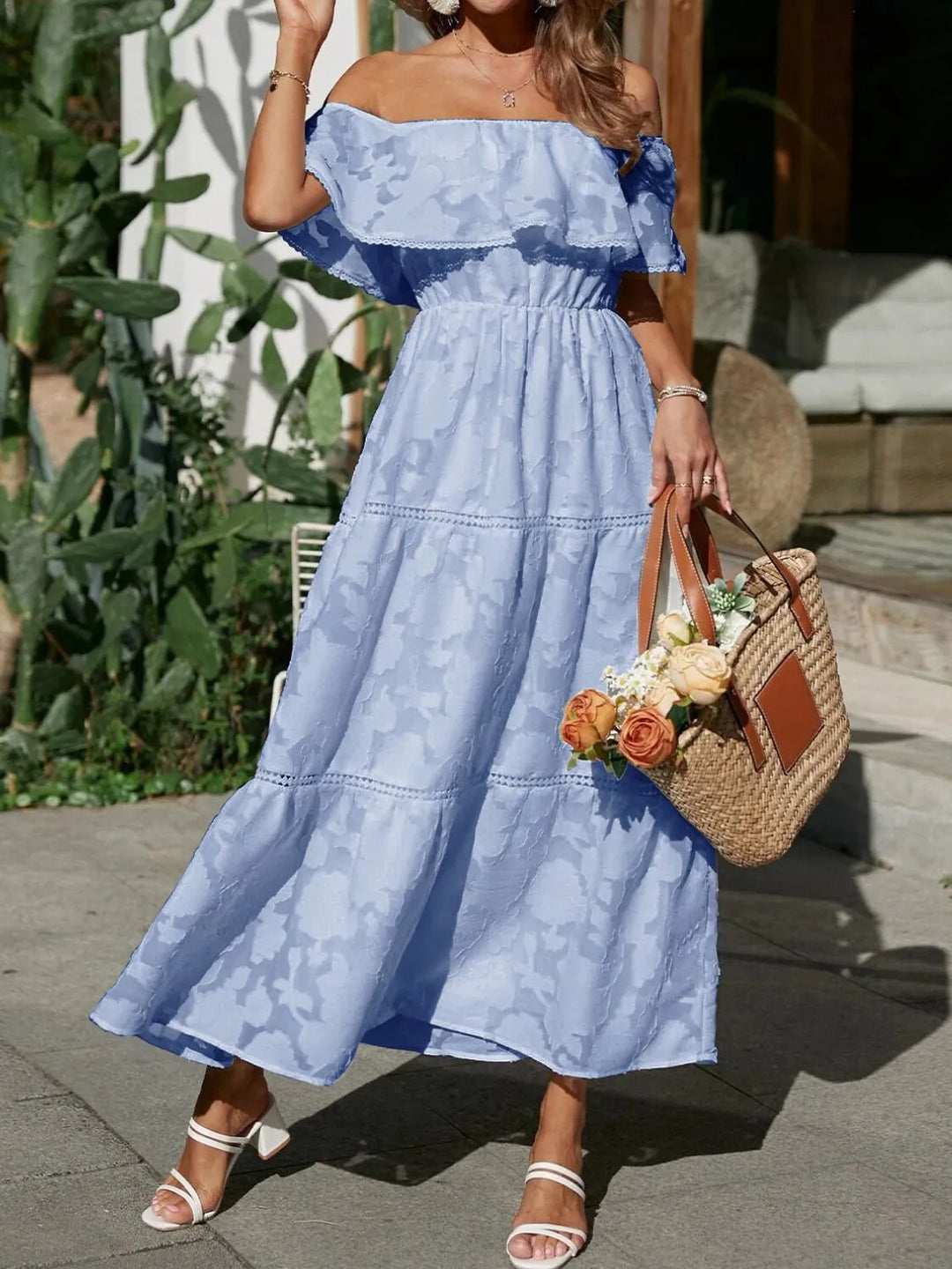 Elegant women's off-shoulder midi dress, tiered design. Ideal wedding guest outfit for summer events.
